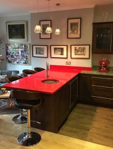 Kitchen peninsula in red quartz